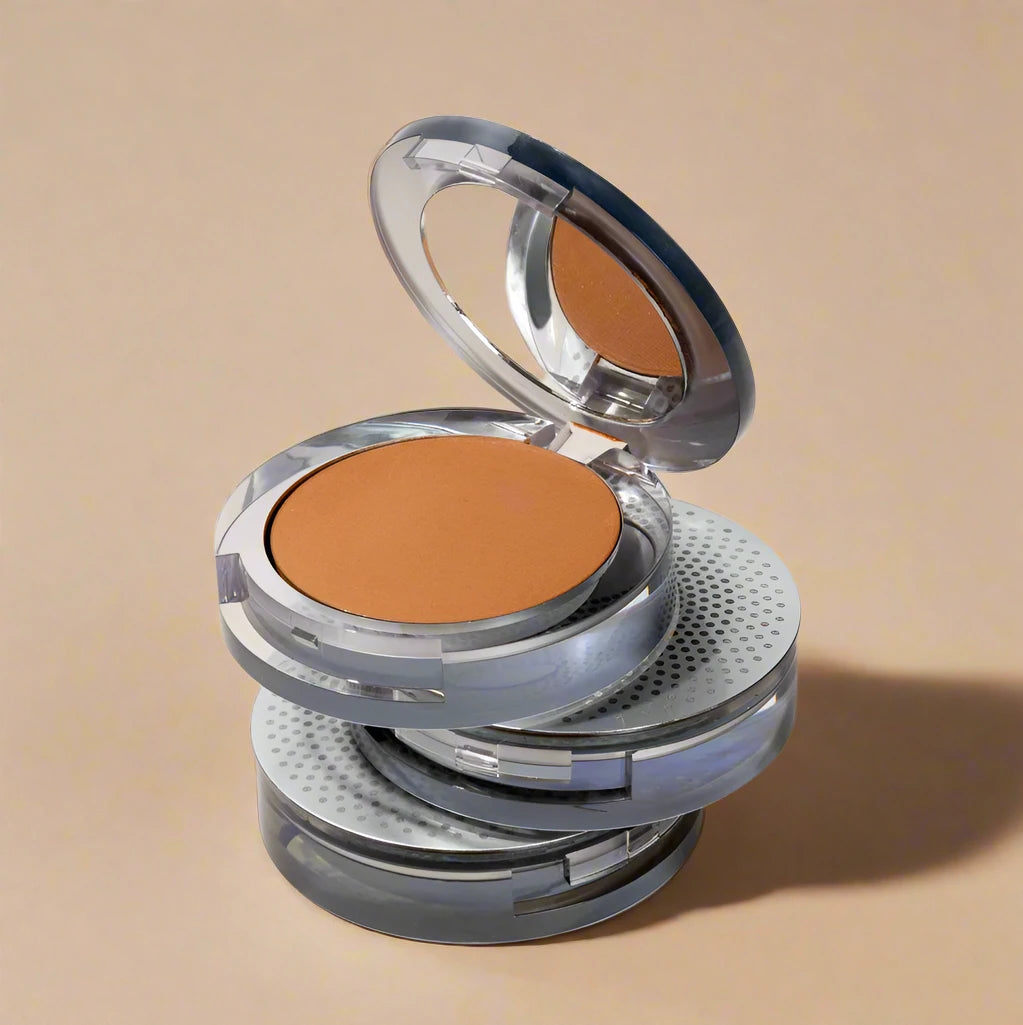 4-in-1 Pressed close up shot of three shades with one open against tan-beige background