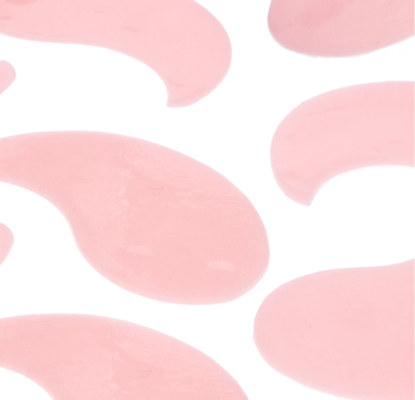 Mellow Eyes in Dragon Fruit - Pink eye patches laying against white background