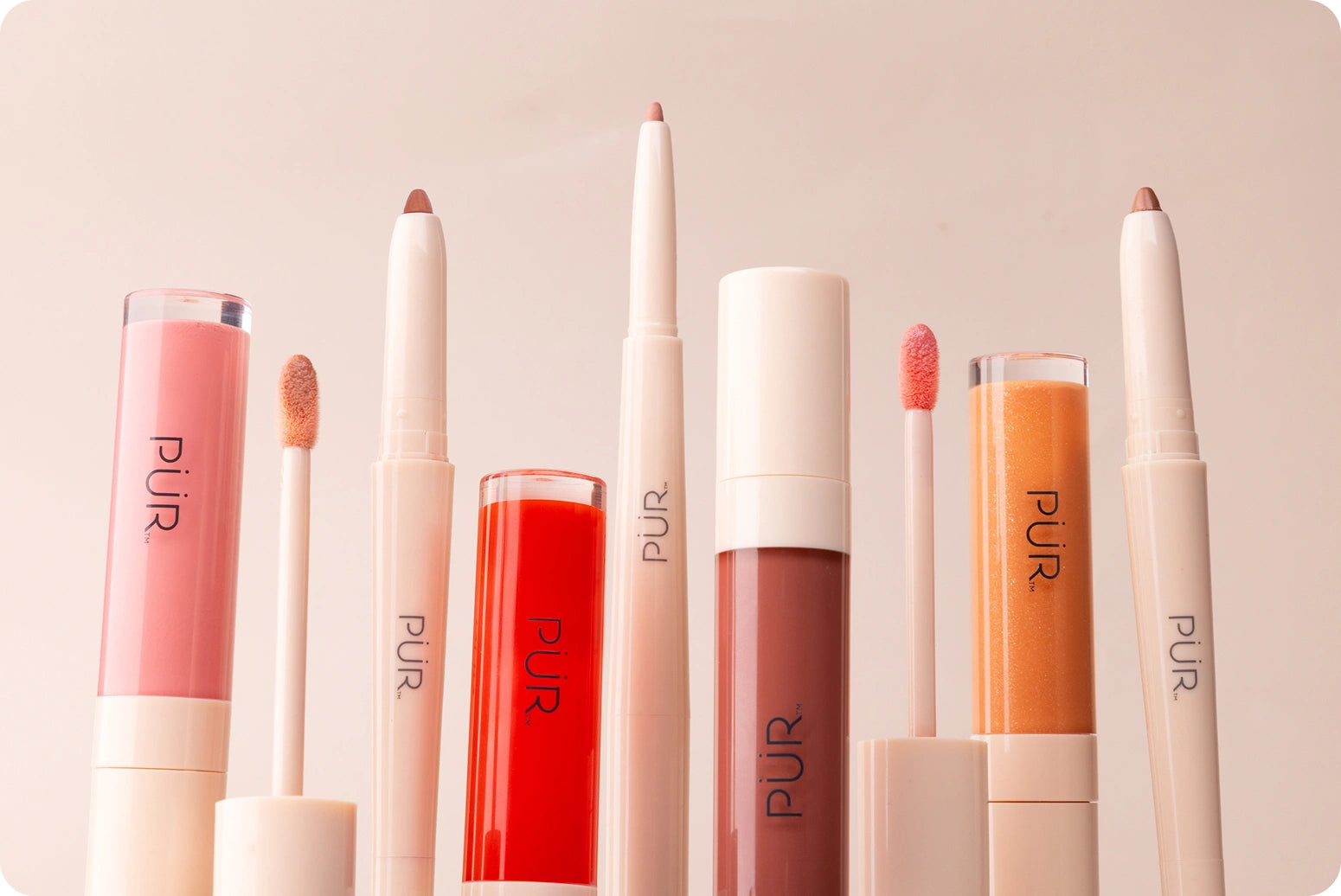 National Lipstick Day: 40% Off Lipstick - Various lip makeup products lined up against pink background