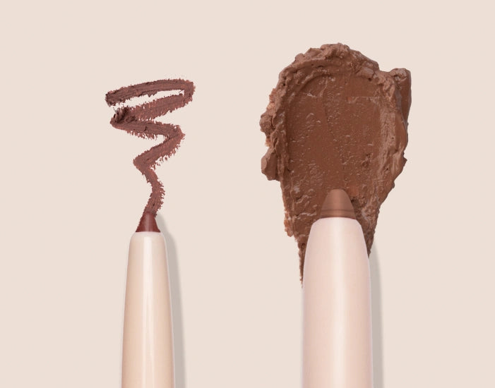 Silky Sculpt - Fine tipped lip liner and ultra smooth cream lipstick, dragging down to reveal swatch on both sides against cream background (cropped)