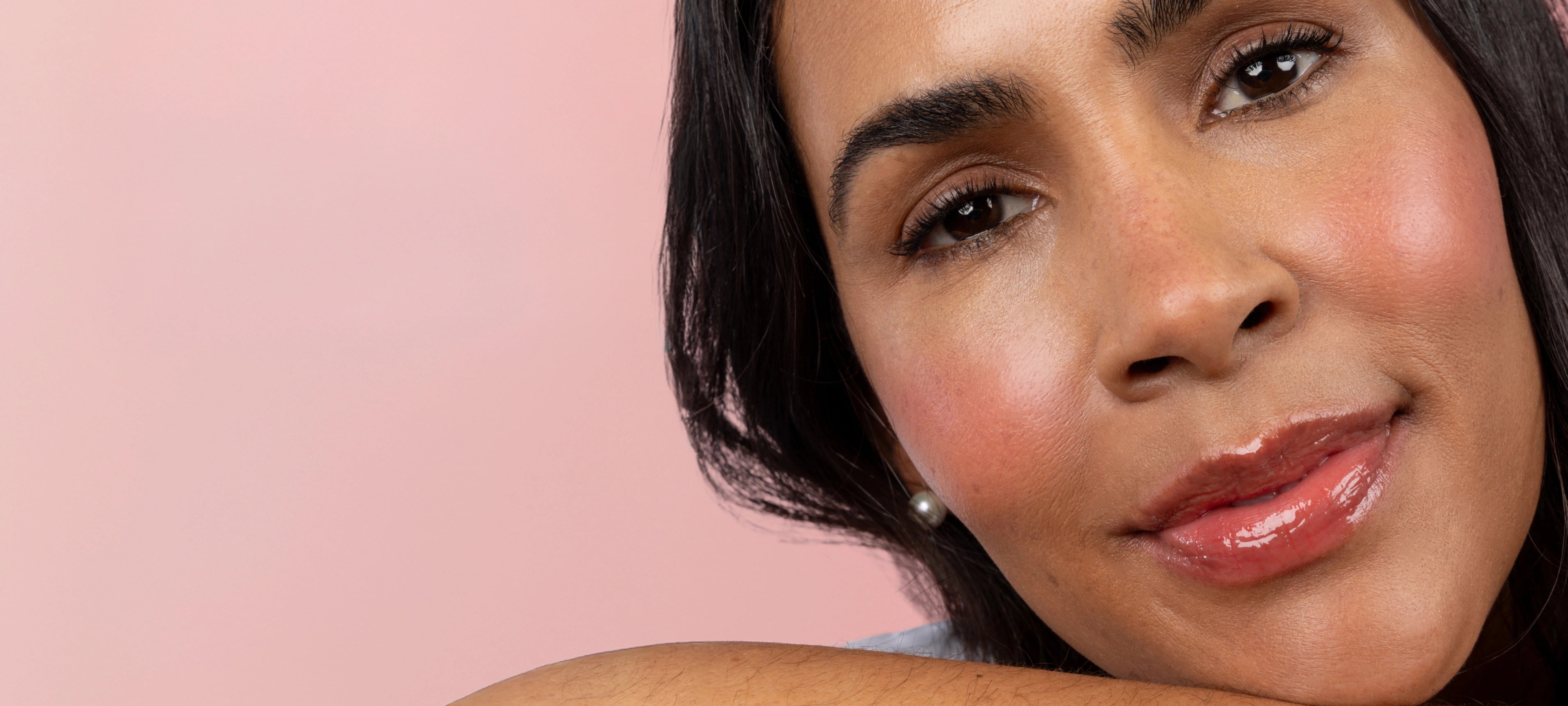 Cherry Blossom -  Close Up Picture of a Model against a light pink background