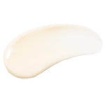 Creamy swatch of PÜR Tropical C Moisturizer showing silky, lightweight texture with luminous finish